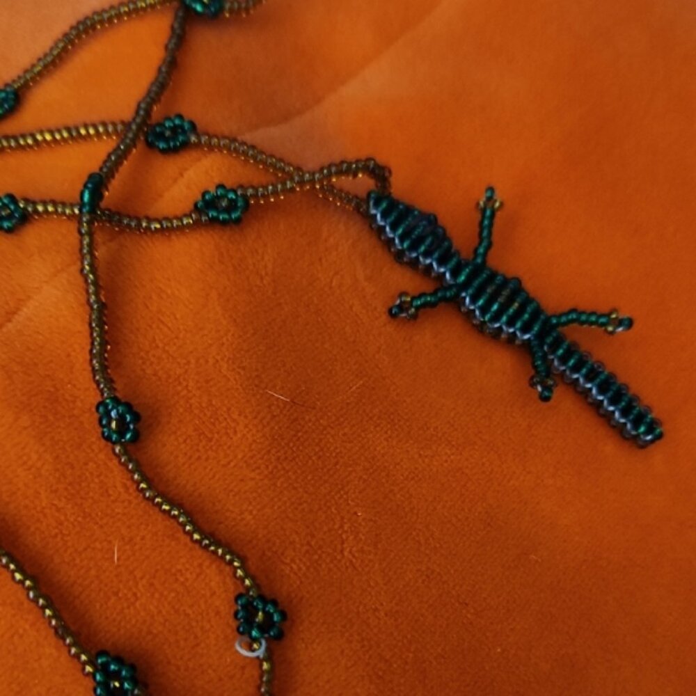 Handcrafted Beaded Necklace Small Crocodile Pendant Floral Accent